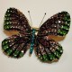 Green butterfly brooch